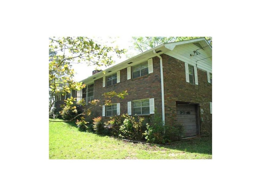 Exterior Front. Looking at home from woods