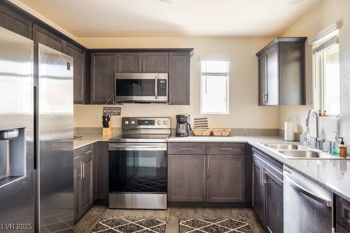 Kitchen featuring appliances with stainless steel