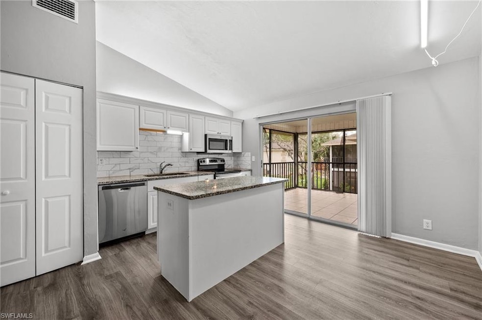 Updated kitchen with vaulted ceiling