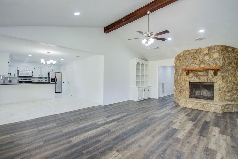 Living room open to Dining area and Kitchen