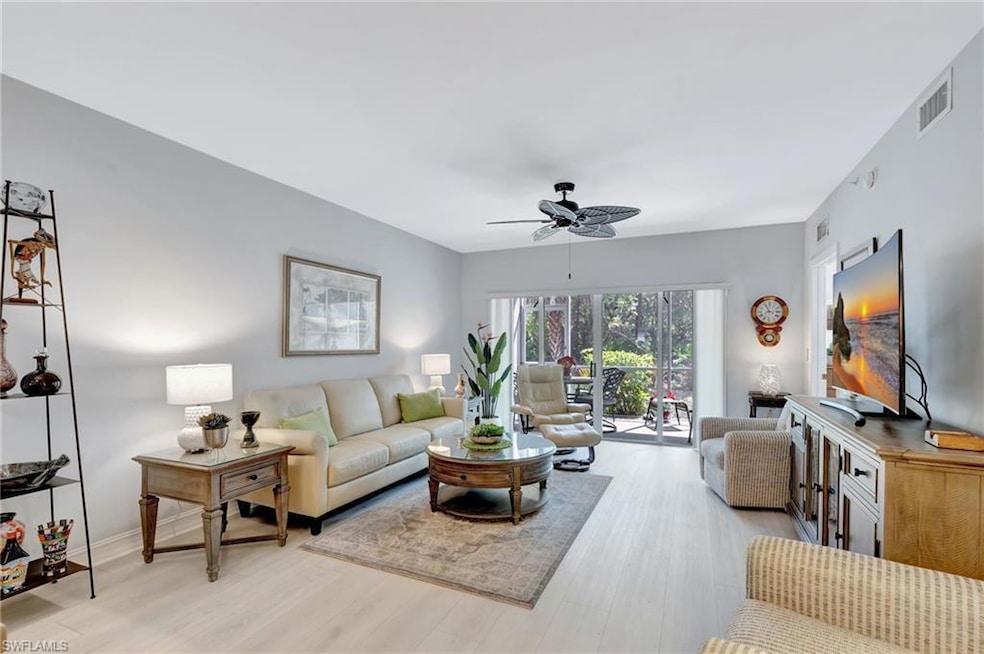 Living room with new Paint, new vinyl flooring, and a beautiful tranquil view
