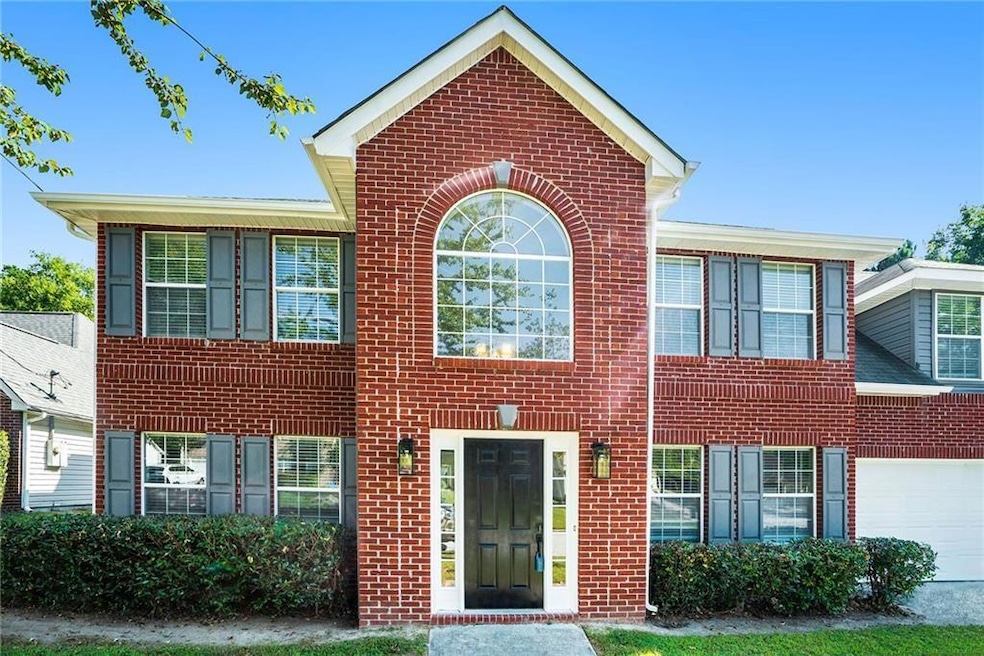 View of front of home featuring a garage