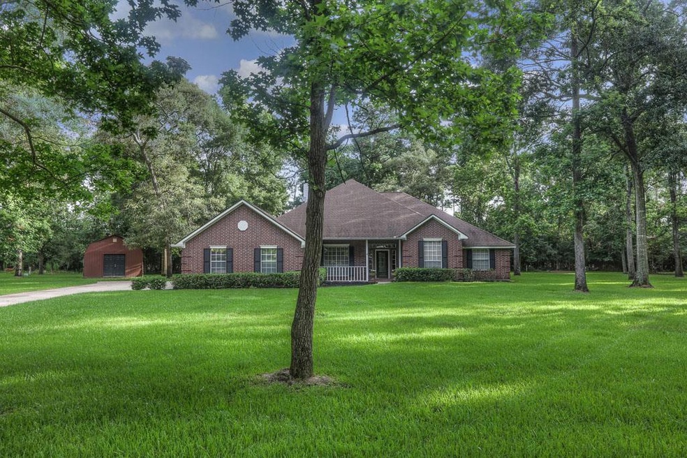 15257 Runnymede St, Conroe, TX 77384 - photo 1