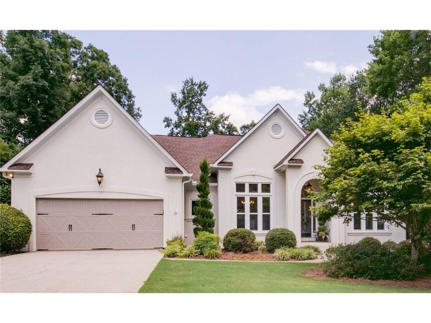 Hardcoat stucco ranch with level driveway