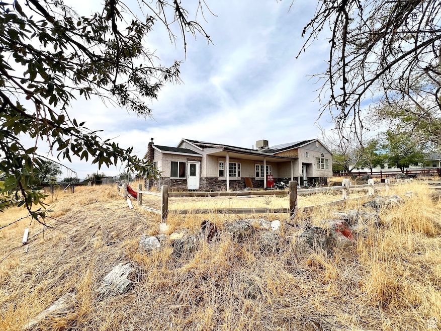 View of front of home featuring stone siding
