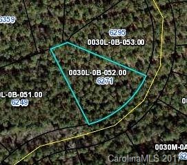 Heavily wooded lot provides the utmost privacy.
