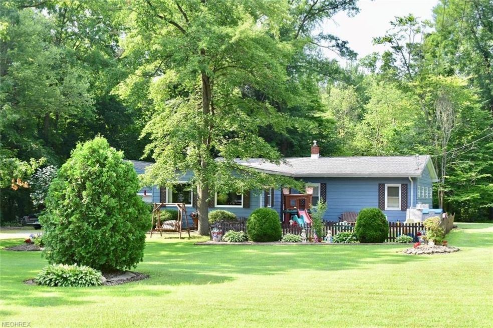 This ranch home is nestled on 2 acres in a beautif