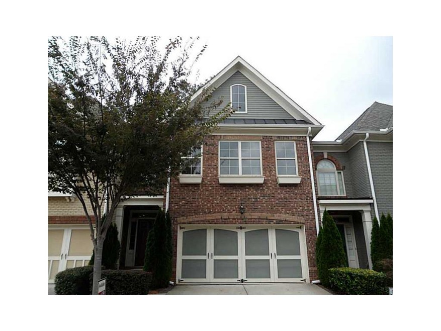 Exterior Front. Great brick front townhome with un