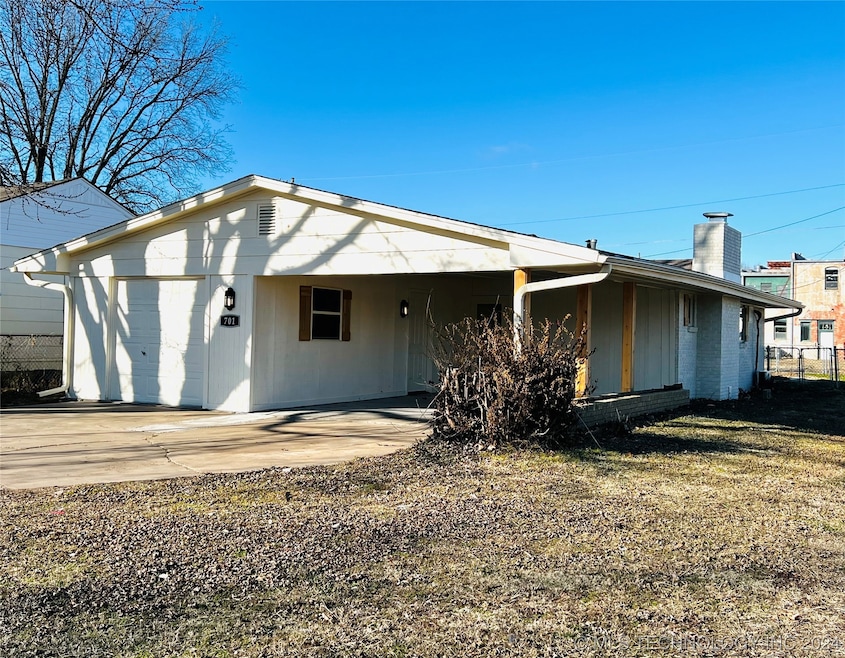 Home with garage and carport
