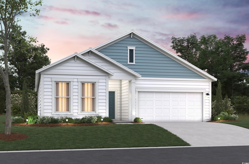 View of front of property featuring a yard, concre