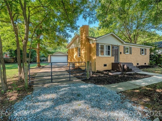 Detached garage with an attached shed in the back 