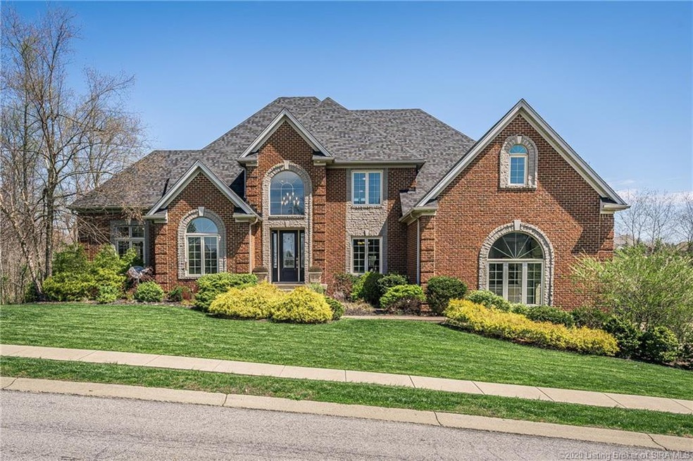 Lovely yard and landscaping. Beautiful curb appeal