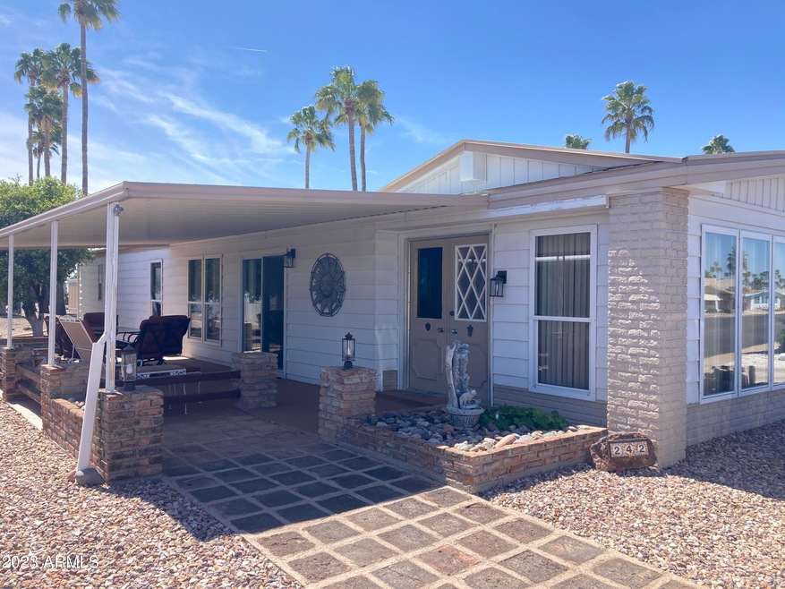 Covered patio and front entrance