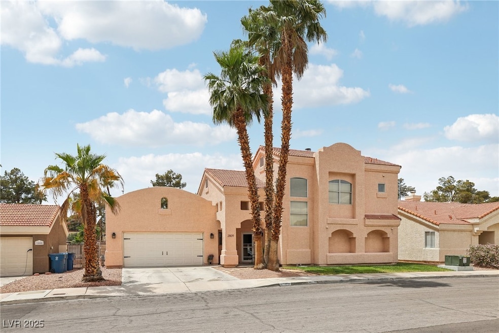 View of front of home featuring stucco siding, an