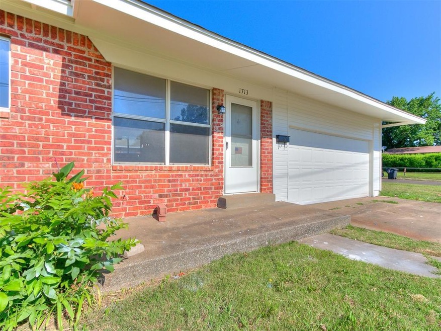Single story home featuring a garage
