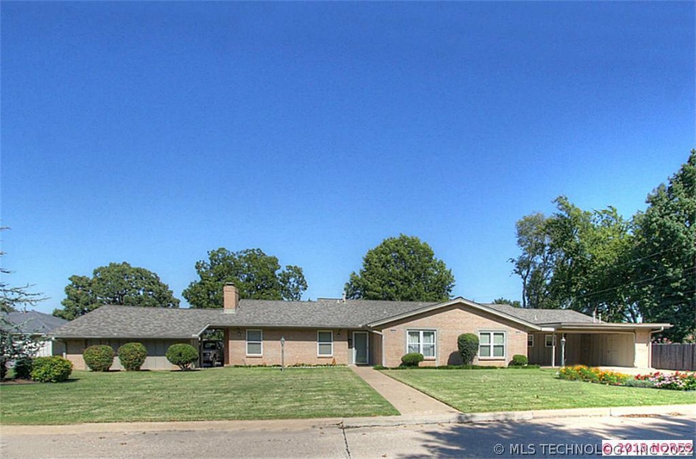 This attractive duplex with great curb appeal is l