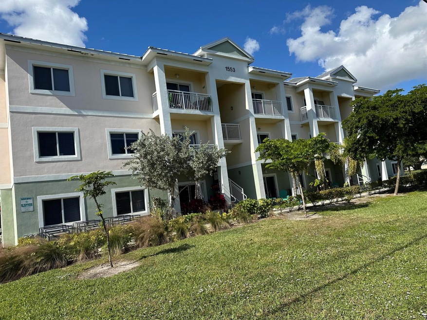 1587 S Florida Mango Rd unit 105, West Palm Beach, FL 33406 - photo 1