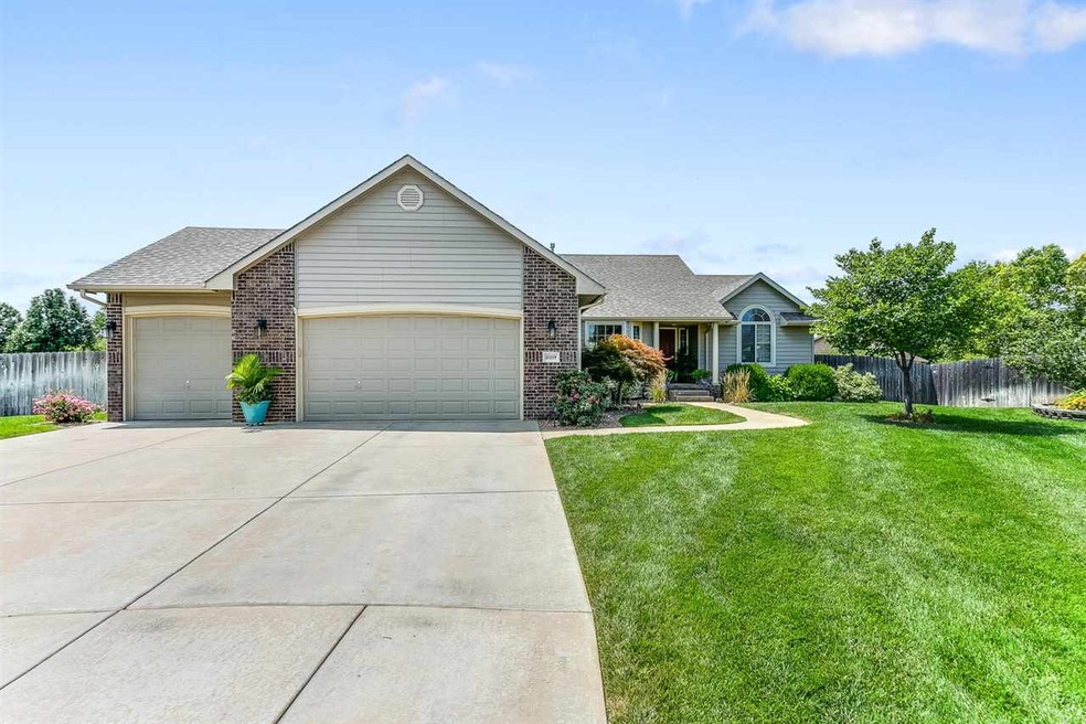 Large 3 car pad with tall garage doors, oversized 