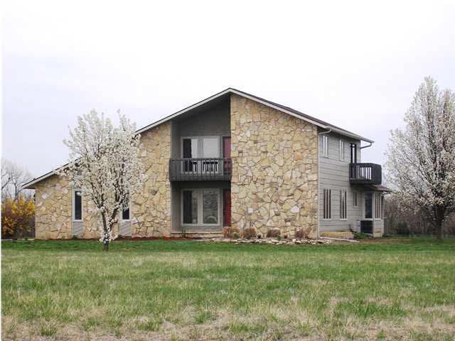 SUPER SUBURBAN ON 5.06 ACRES CLOSE IN!