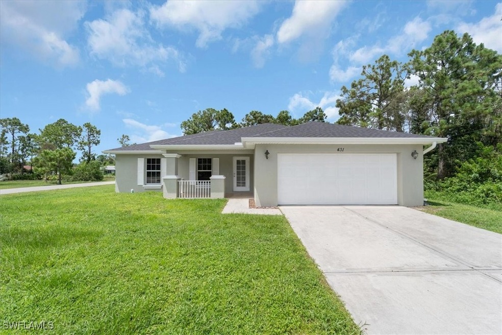 431 Broadmoor St, Lehigh Acres, FL 33974 - photo 1