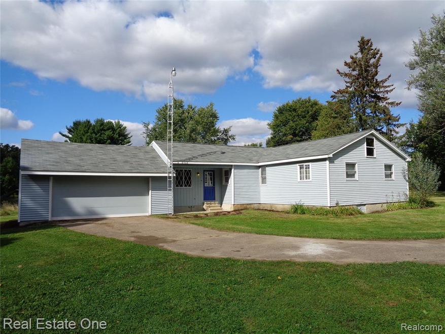 Welcome Home!!  Side view showcasing attached, ove
