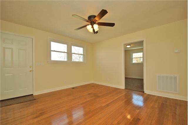 View of den facing front door...this place is immaculate!