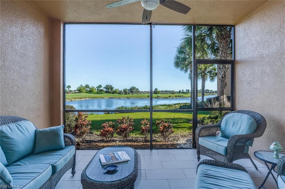 Picture perfect tiled lanai with lake and golf Sou
