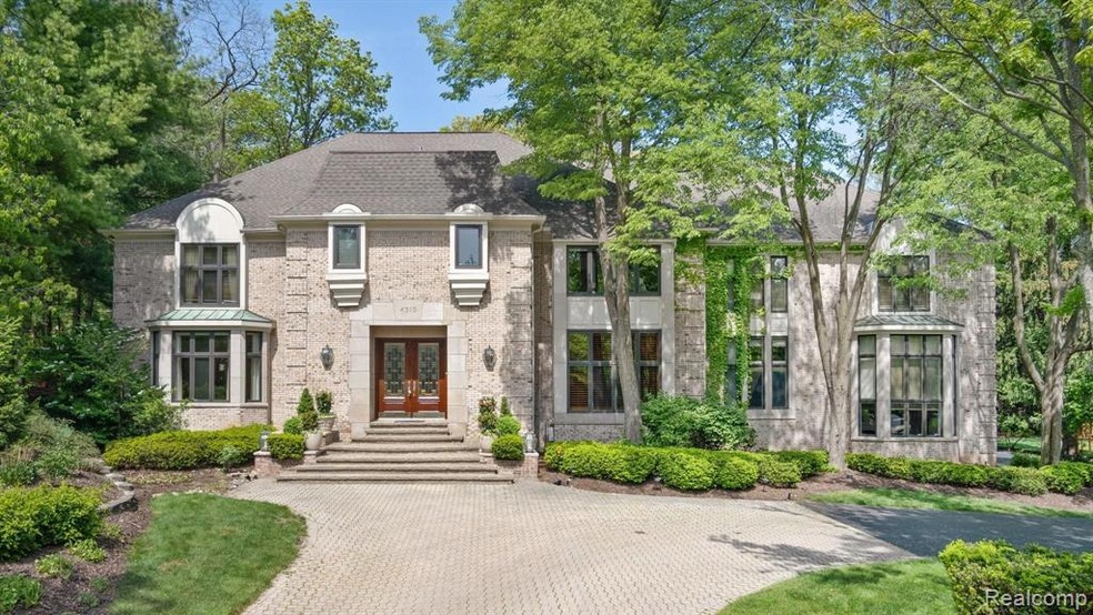 Gracious front entrance with custom paver circular
