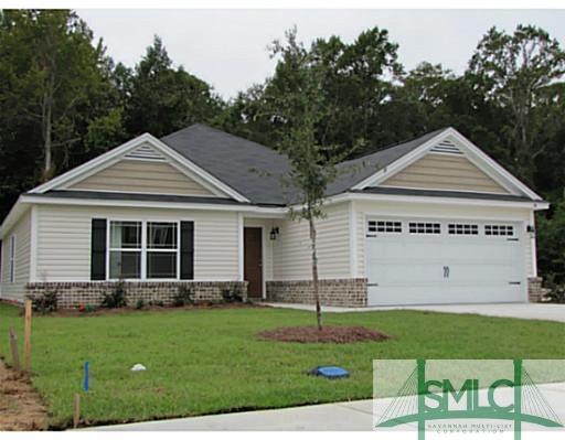 Exterior Front. Cottage Exterior with Brick Accent