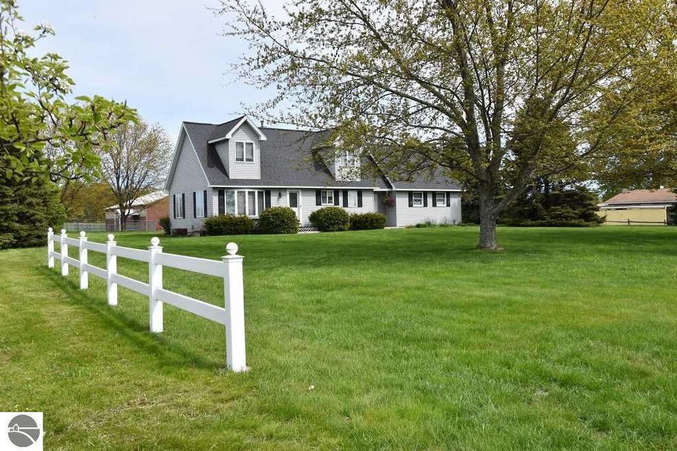 13467 S Bugai Rd, Traverse City, MI 49684 - photo 1