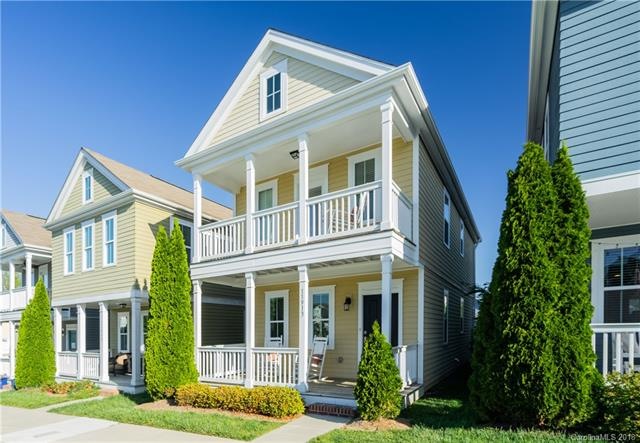This charming home with double porch sits on a gor