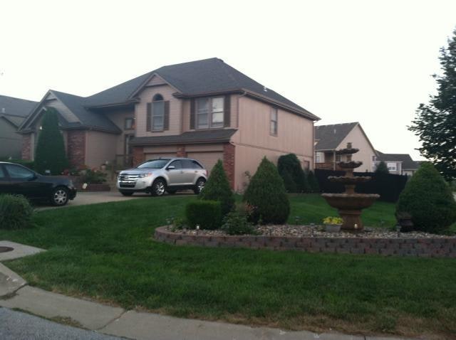 1014 Camelot Dr, Raymore, MO 64083 - photo 1