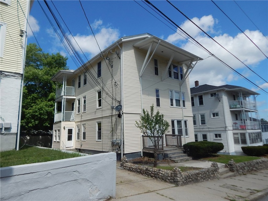 Front, updated with vinyl siding.