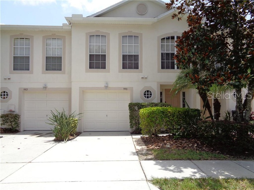 Front view of townhome that's been recently power washed.