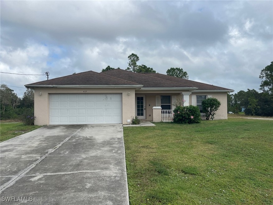 409 La Perouse St, Lehigh Acres, FL 33974 - photo 1