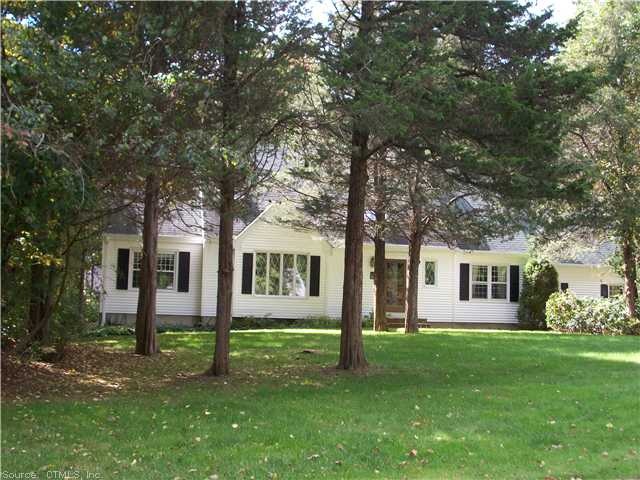 Exterior Front. Contemporized cape on a corner lot