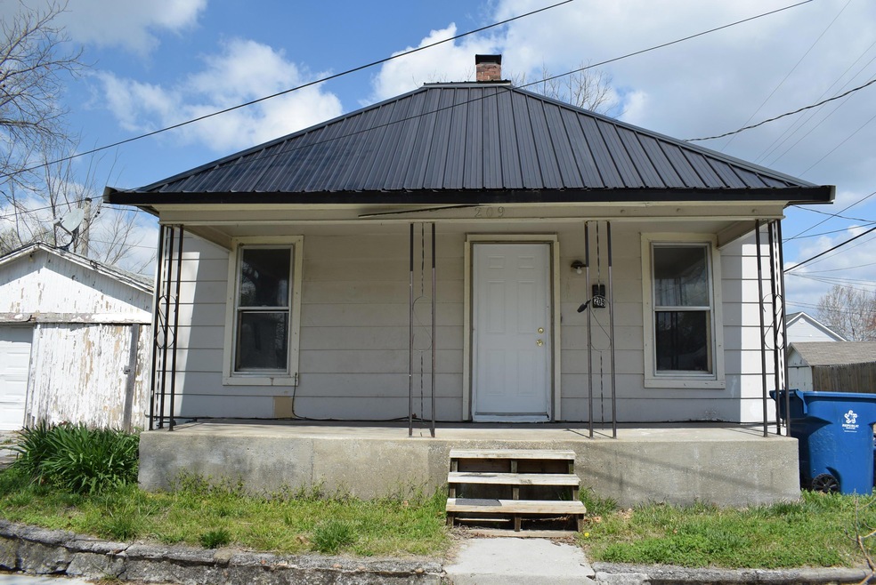 209 E 19th