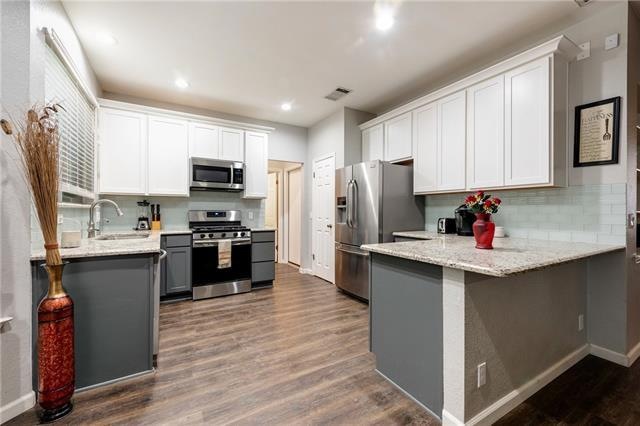 Beautiful updates in kitchen where you'll enjoy cr