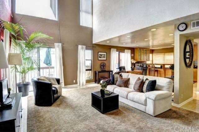 Open floor plan with vaulted ceilings and huge win
