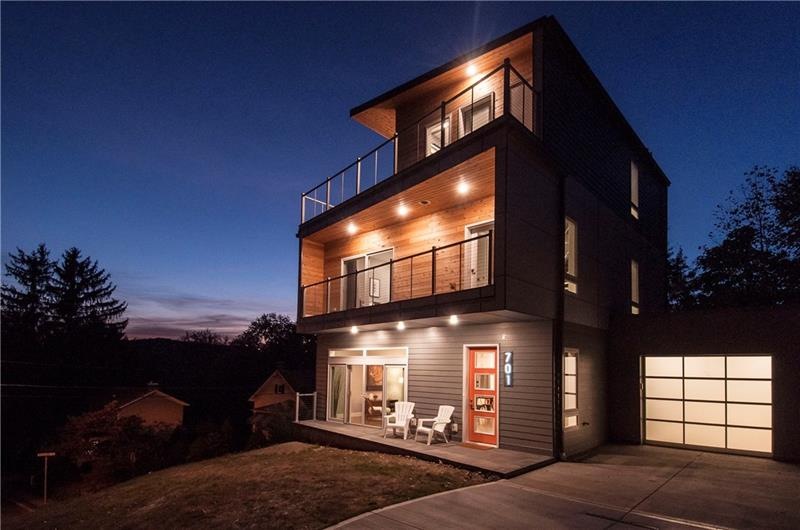 Perched atop Chestnut, this brand new home is defi