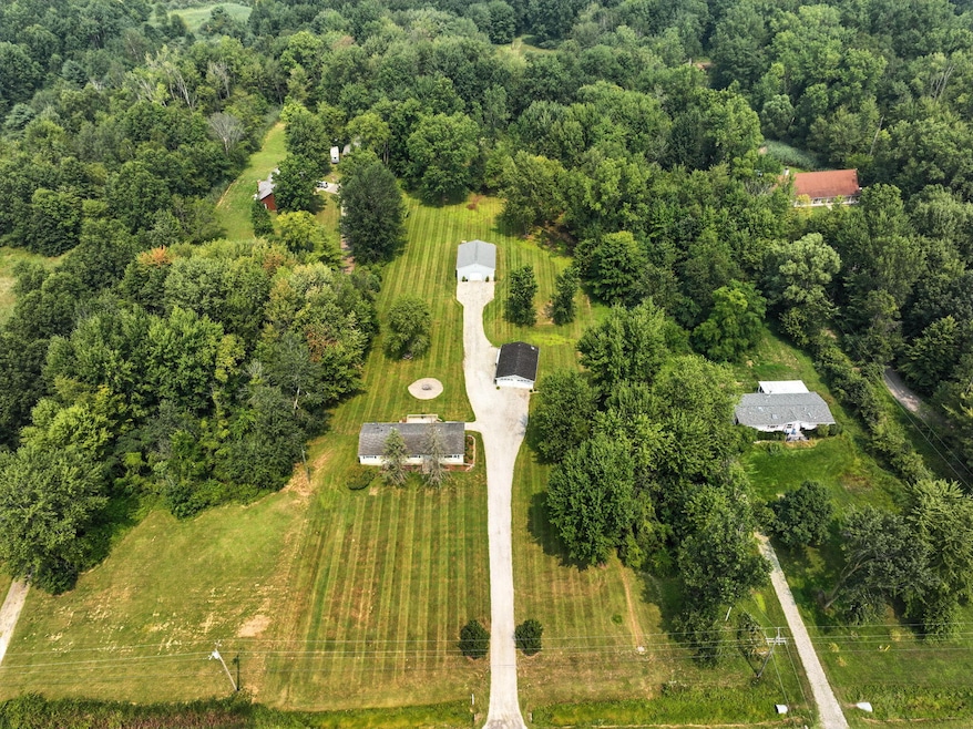 7744 Puttygut Rd, Casco, MI 48064 - photo 1