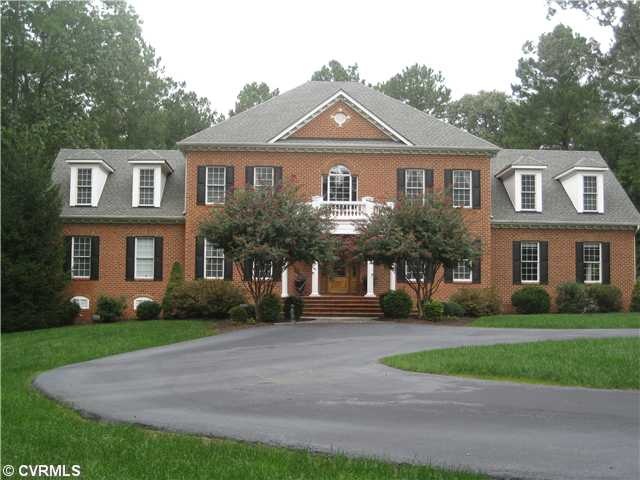 Exterior Front - This all brick beauty is in move 