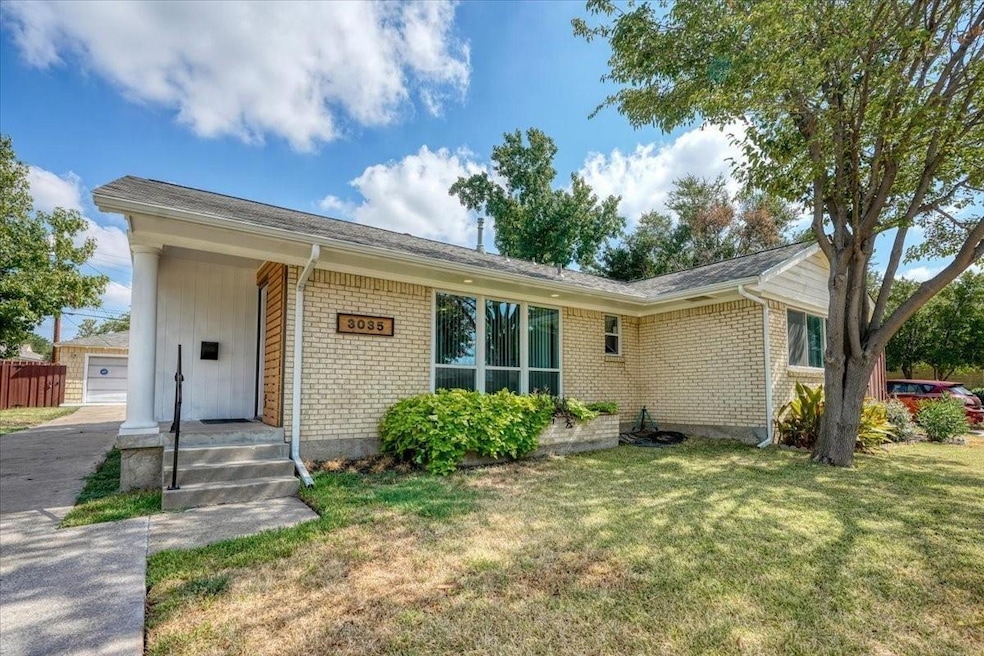 Ranch-style home featuring brick siding, a garage,