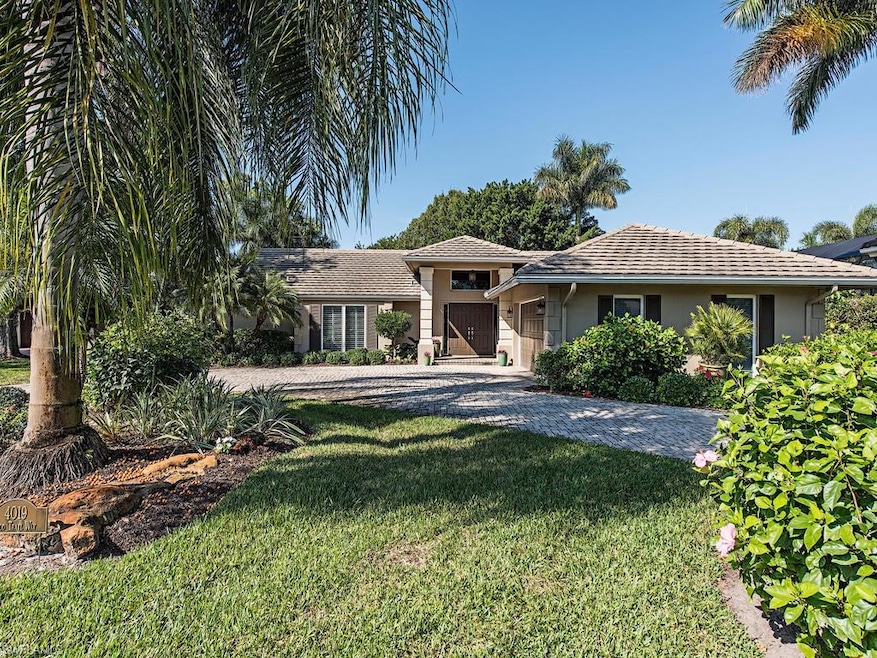 4019 Old Trail Way, Naples, FL 34103 - photo 1