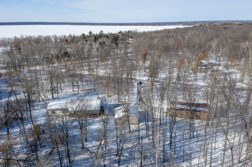 4.9 acres, pole barn, and garage.