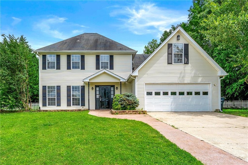 View of front of property with driveway