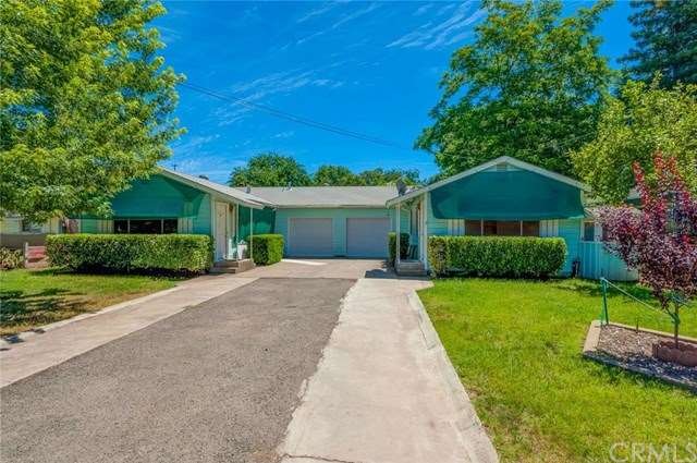 Turnkey duplex with 1 car garages and plenty of pa