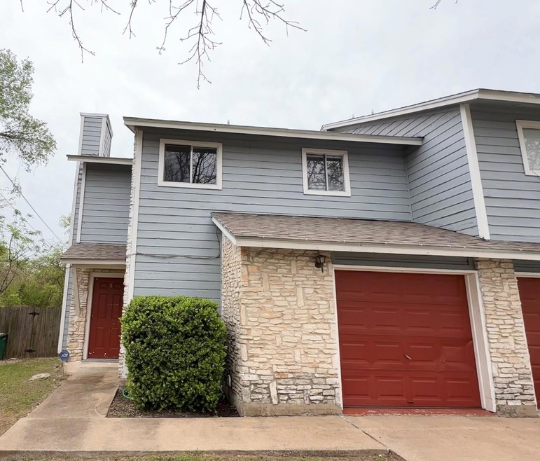 Multi unit property with stone siding, an attache