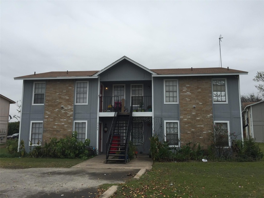 Townhome / multi-family property with stairway, a