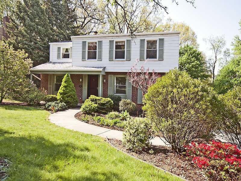 Exterior Front. Great curb appeal with mature plan
